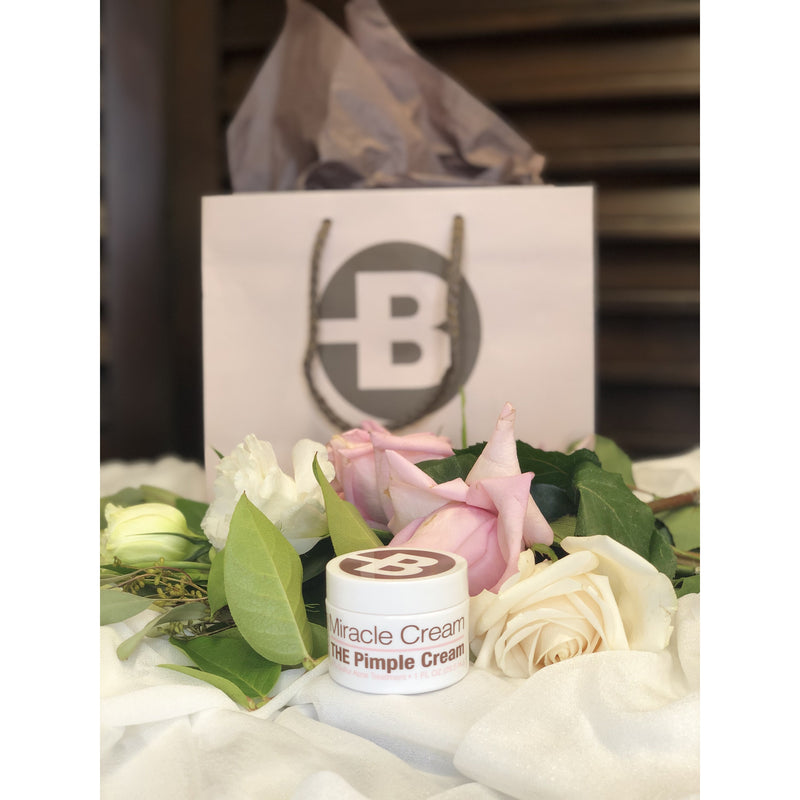 An Image of the my pimple cream in white sleek design container